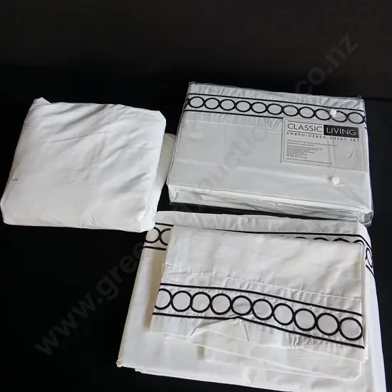 2 BRAND NEW SETS OF EMBROIDERED SHEET SETS AND ONE FITTED SHEET