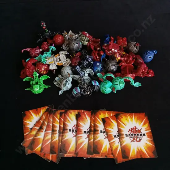 COLLECTION OF BAKUGAN CARDS AND TOYS