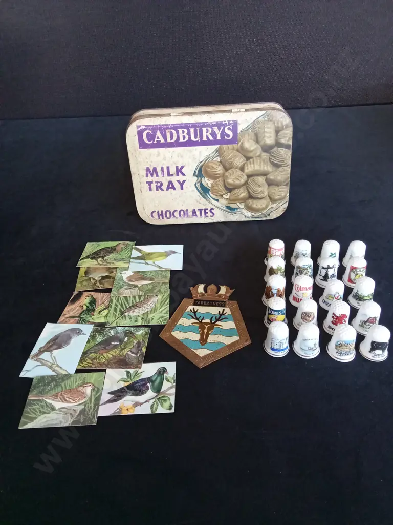 COLLECTION OF THIMBELS AND NZ BIRD CARDS IN A VINTAGE CADBURY TIN Image 1++
