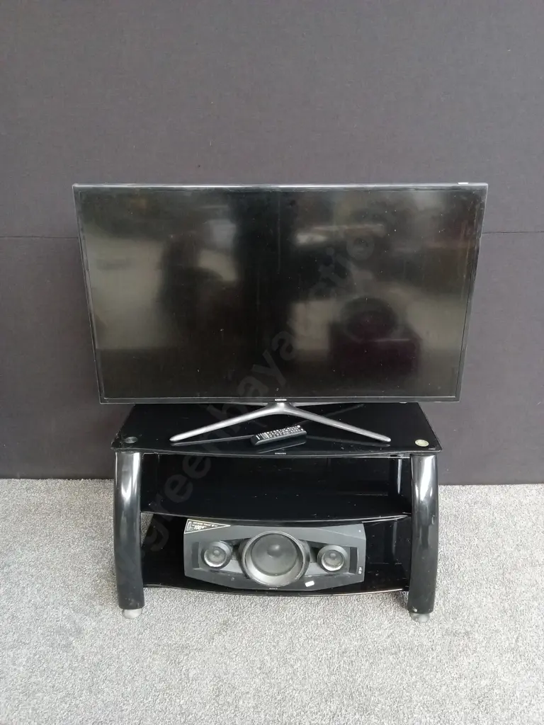 TV STAND WITH A SAMSUNG TV AND SONY SPEAKER BOTH TESTED AND WORKING Image 1++