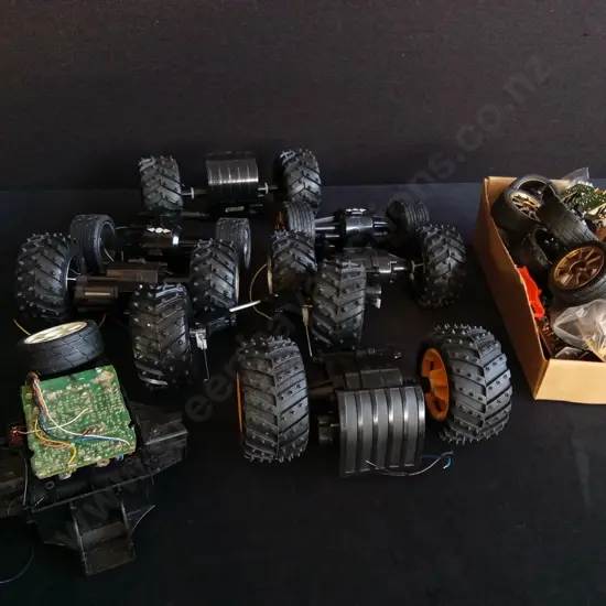 BOX OF MONSTER TRUCK PARTS