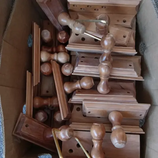 BOX OF WOODEN CURTAIN ROD BRACKETS