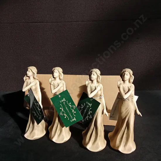 BRAND NEW SETS OF FOUR DECORATIVE FIGURES