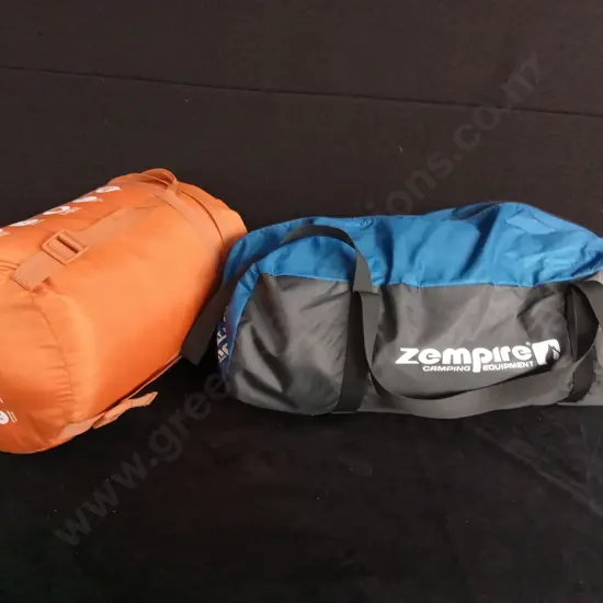 ZEMPIRE POCKET ROCKET SHOWER AND A SLEEPING BAG