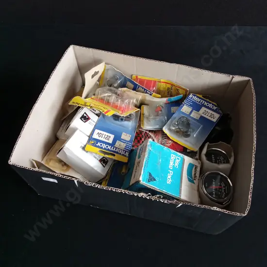 BOX OF AUTOMOTIVE REPLACEMENT PARTS