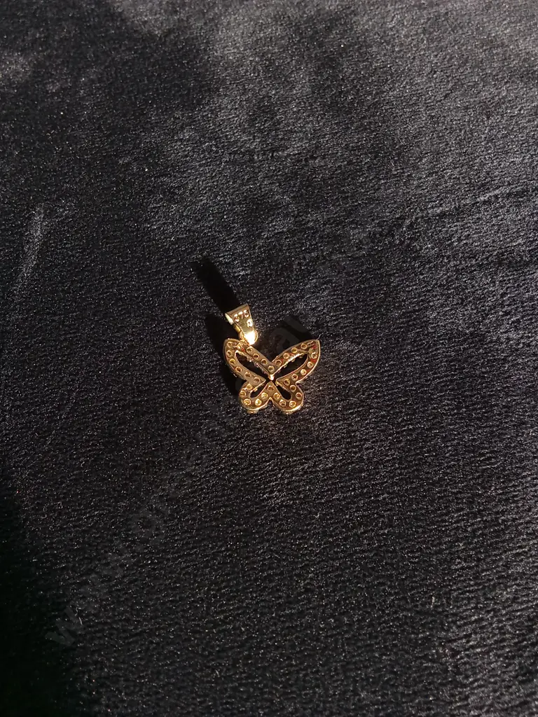9 KARAT GOLD CUBIC ZIRCONIA BUTTERFLY CHARM Image 1++