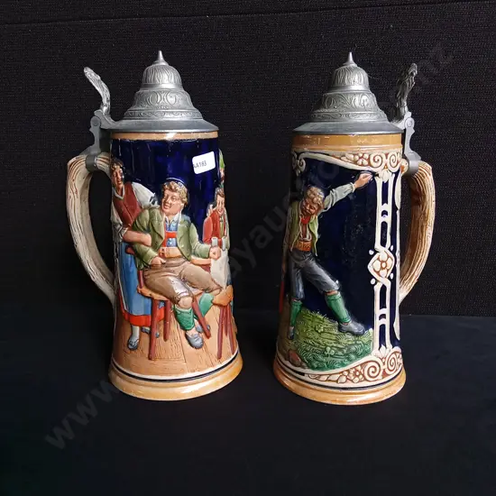 PAIR OF VINTAGE GERMAN BEER STEINS