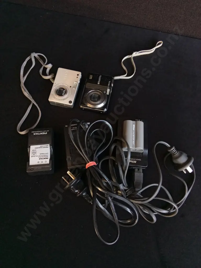 DIGITAL CAMERAS AND CAMERA BATTERY CHARGERS Image 1++