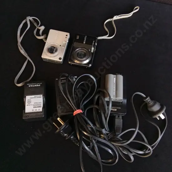 DIGITAL CAMERAS AND CAMERA BATTERY CHARGERS