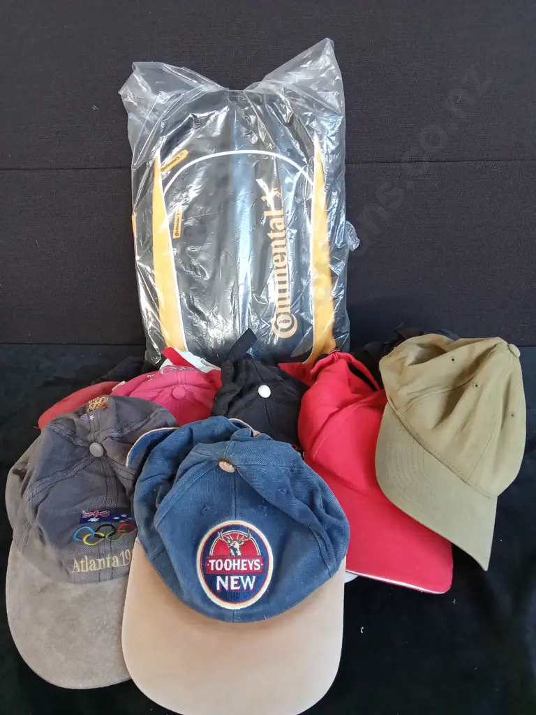 COLLECTION OF HATS AND A BRAND NEW CONTINENTAL BACKPACK Image 1++