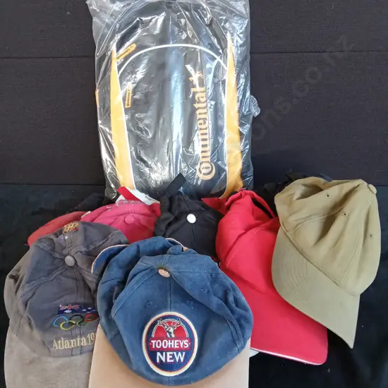 COLLECTION OF HATS AND A BRAND NEW CONTINENTAL BACKPACK