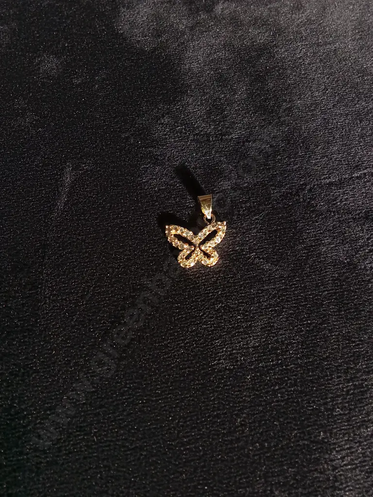 9 KARAT GOLD CUBIC ZIRCONIA BUTTERFLY CHARM Image 1++