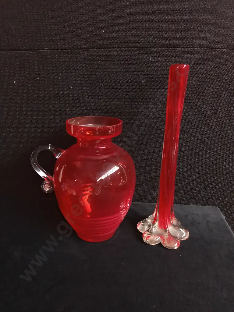 2 VINTAGE RED ART GLASS ITEMS, PITCHER VASE AND TWISTED ELEPHANT FOOT BUD VASE Image 1++