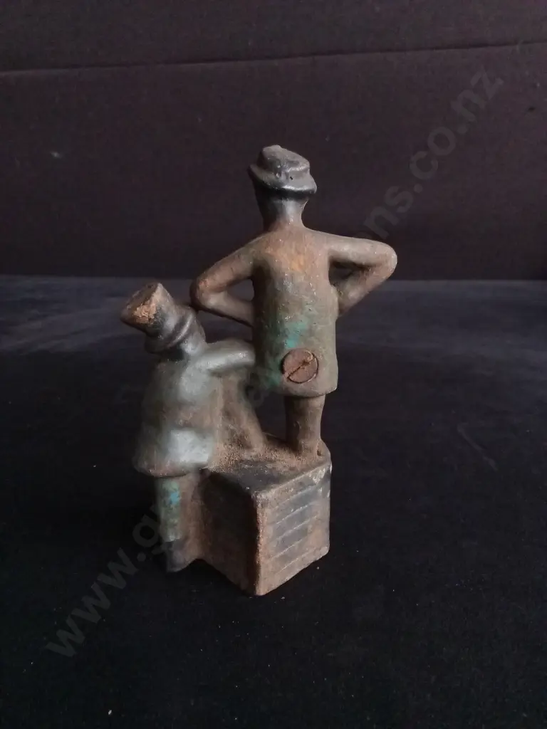 ANTIQUE "MUTT AND JEFF" CAST IRON STILL PENNY BANK, EARLY 20TH CENTURY A.C. WILLIAMS CASTING APPROX 12CM HIGH Image 1++