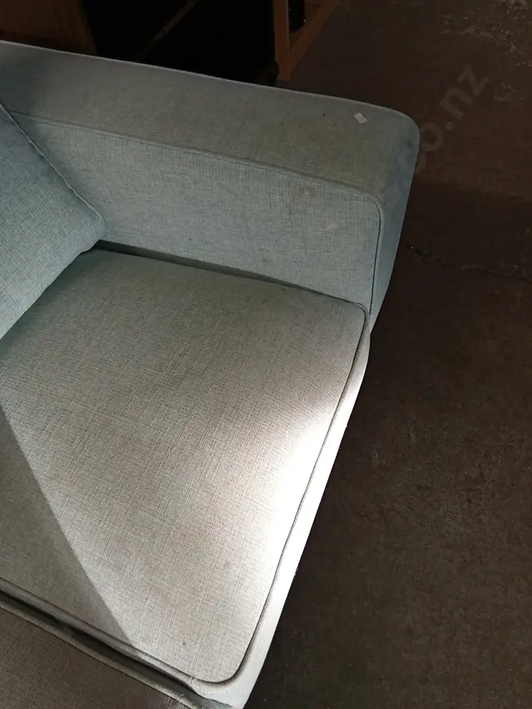 TWO SEATER BLUE FABRIC COUCH HAS A FEW STAINS AS SHOWN IN PHOTOS Image 1++