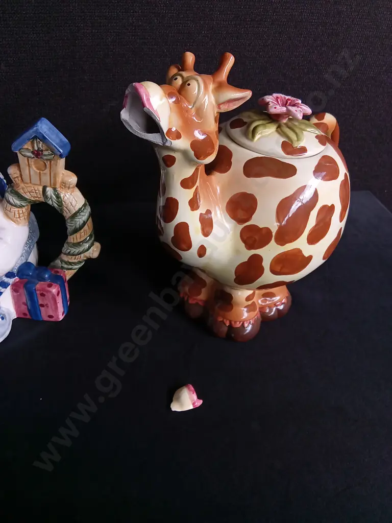 PAIR OF NOVELTY TEAPOTS, BOTH DAMAGED INCLUDING BROKEN PIECE OF GIRAFFE TEAPOT Image 1++