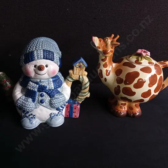 PAIR OF NOVELTY TEAPOTS, BOTH DAMAGED INCLUDING BROKEN PIECE OF GIRAFFE TEAPOT