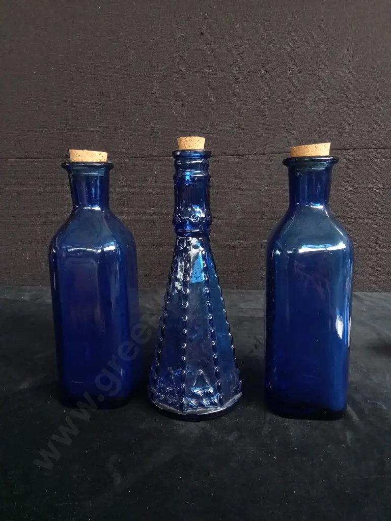 VINTAGE COBALT BLUE GLASS DECANTER AND 2 VINTAGE COBALT BLUE BOTTLES Image 1++