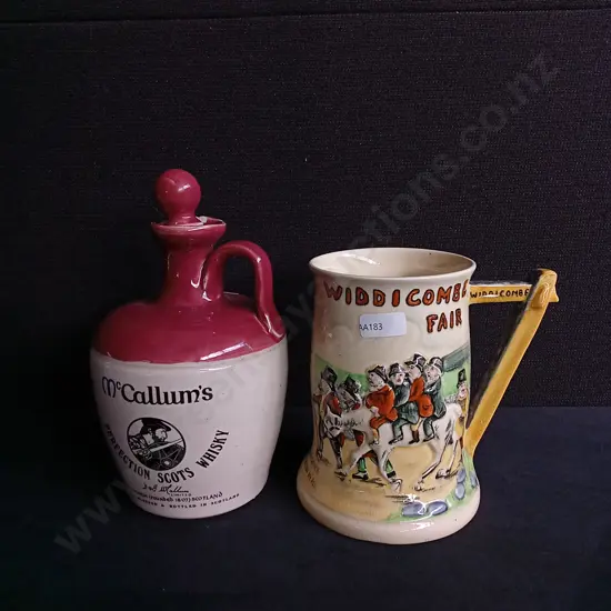 2 PIECES VINTAGE MCCALLUM'S DECANTER AND MUSICAL TANKARD