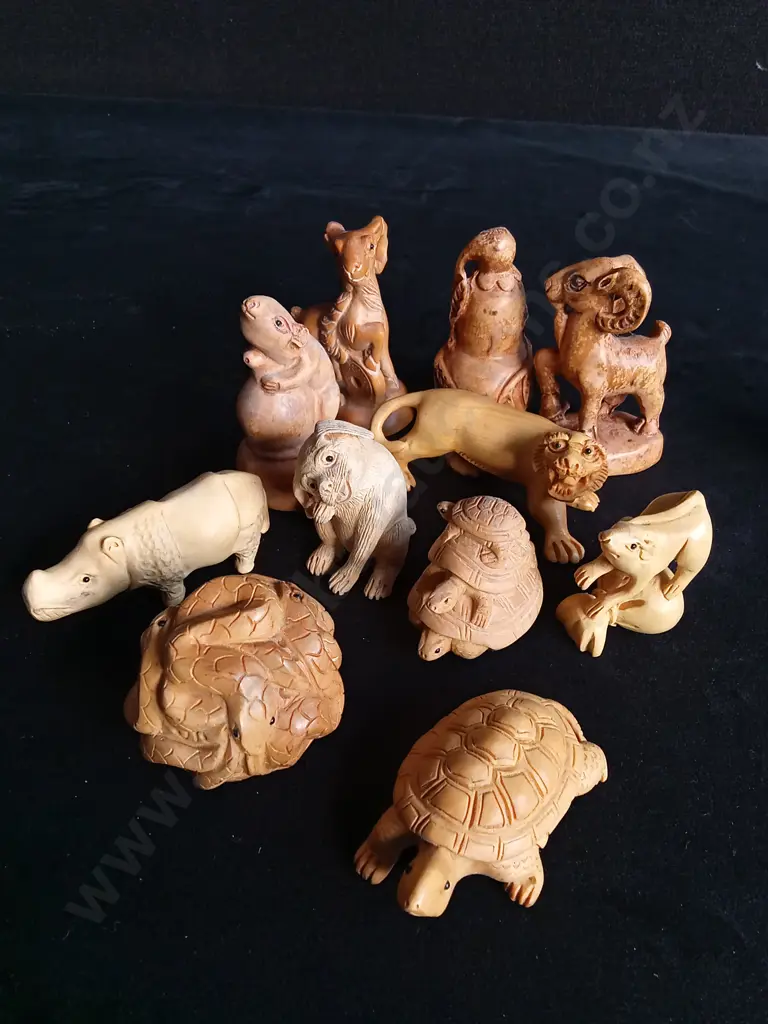 11 CAVED WOODEN ANIMAL FIGURES Image 1++