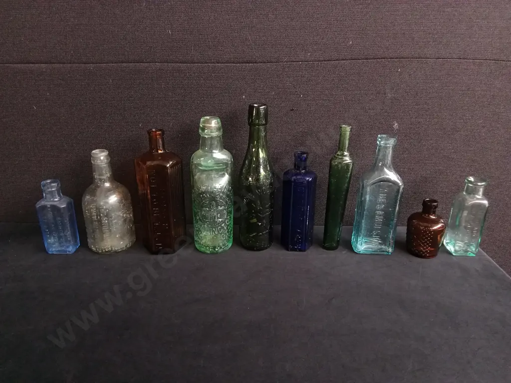 LOT OF 10 ANTIQUE GLASS BOTTLES, INCLUDING CHEMIST, PATENT MEDICINE AND COLOGNE Image 1++