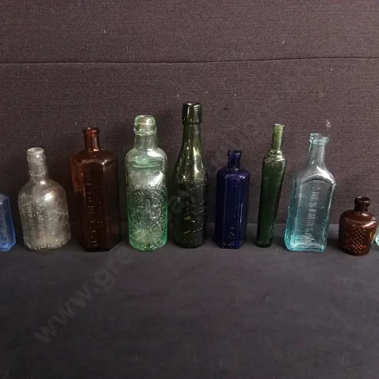 LOT OF 10 ANTIQUE GLASS BOTTLES, INCLUDING CHEMIST, PATENT MEDICINE AND COLOGNE
