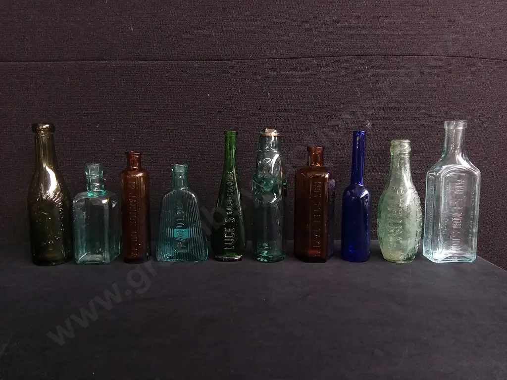 LOT OF 10 ANTIQUE GLASS BOTTLES, INCLUDING CHEMIST, PATENT MEDICINE AND COLOGNE Image 1++