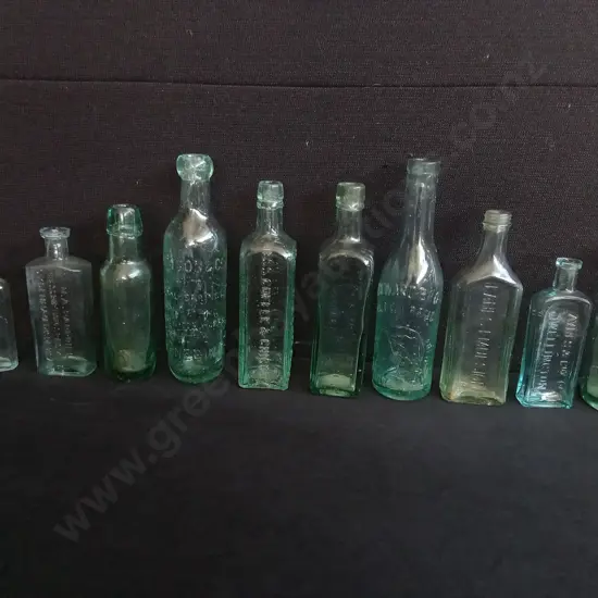 LOT OF 10 VINTAGE AND ANTIQUE LARGE GLASS BOTTLES, INCLUDING LANE'S EMULSION