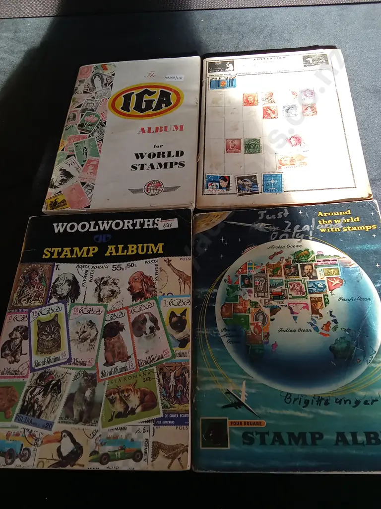 4 STEP BOOKS WITH STAMPS INSIDE Image 1++