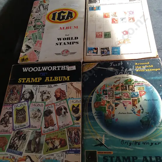 4 STEP BOOKS WITH STAMPS INSIDE