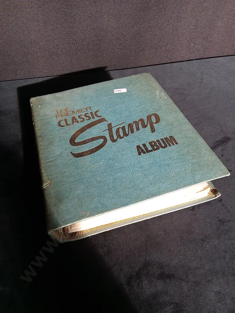 THE PREMIER CLASSIC STAMP ALBUM INCLUDING STAMPS Image 1++
