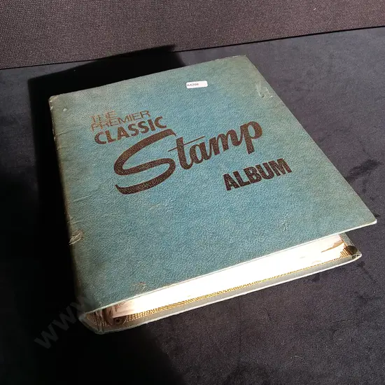 THE PREMIER CLASSIC STAMP ALBUM INCLUDING STAMPS