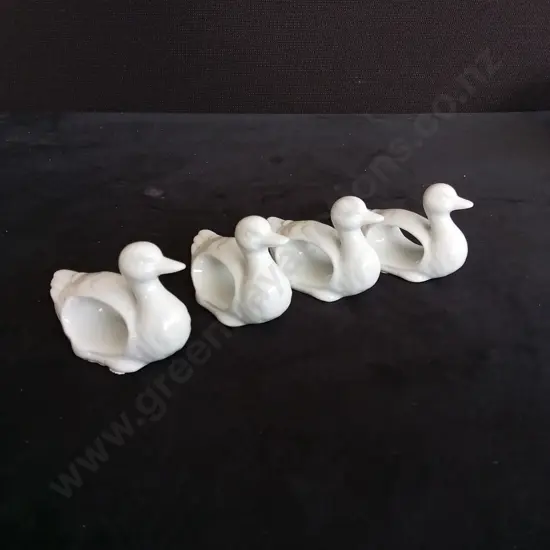 4 SMALL CERAMIC DUCKS