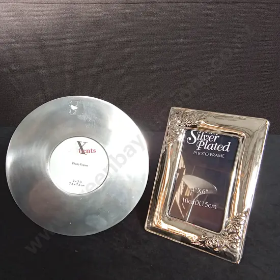 2 SILVER PLATED PHOTO FRAMES