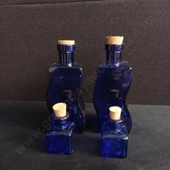 4 PIECES COBALT BLUE GLASS BOTTLES
