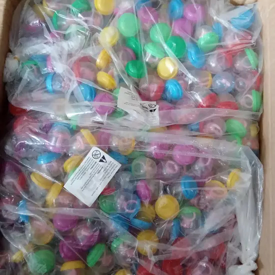 BOX OF PLASTIC CAPSULES FULL OF COSTUME JEWELLERY FOR VENDING MACHINE