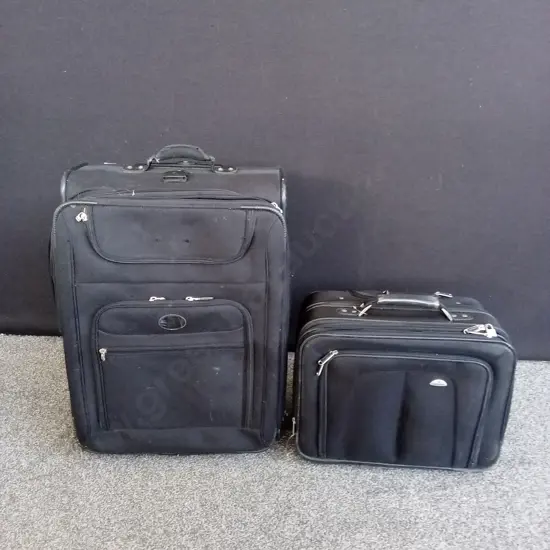 2 SUITCASES AND A DUFFLE BAG