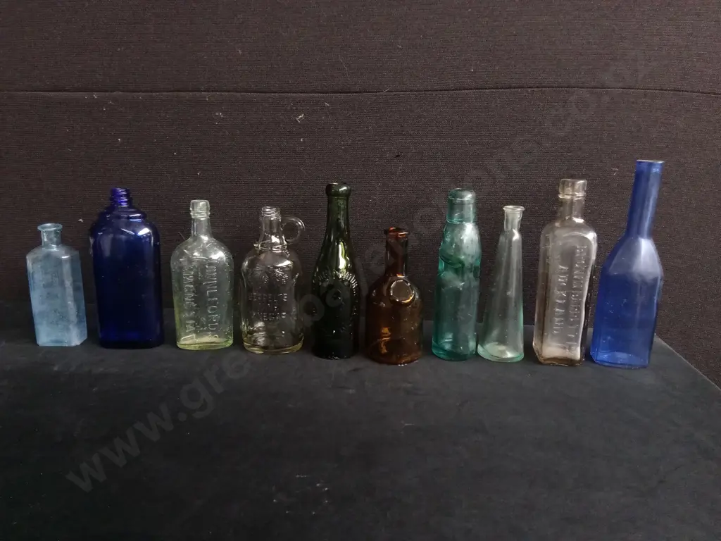 COLLECTION OF 10 ANTIQUE GLASS BOTTLES Image 1++