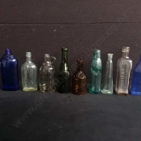 COLLECTION OF 10 ANTIQUE GLASS BOTTLES