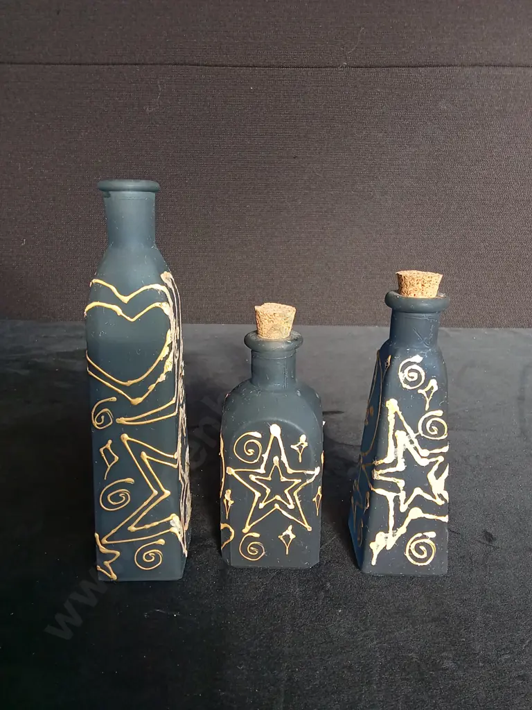 3 DECORATED GLASS BOTTLES Image 1++