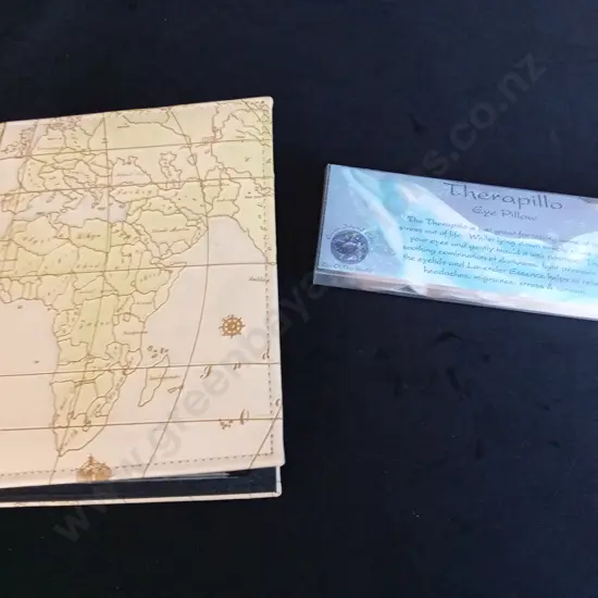 PHOTO ALBUM CONTAINING VINTAGE POST CARDS AND A THERAPILLO EYE PILLOW