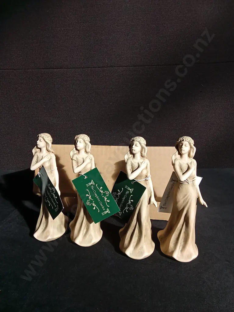 BRAND NEW SETS OF FOUR DECORATIVE FIGURES Image 1++