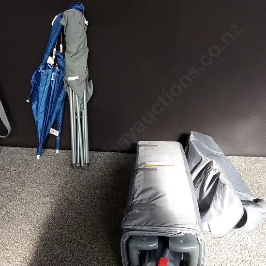 TRAVEL COT ON WEELS AND A CAMPING CHSIR WITH CLIP ON UMBRELLAS