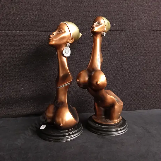 PAIR OF BRONZE COLOURED FINISHED SCULPTURES, TALLEST H 33 CM