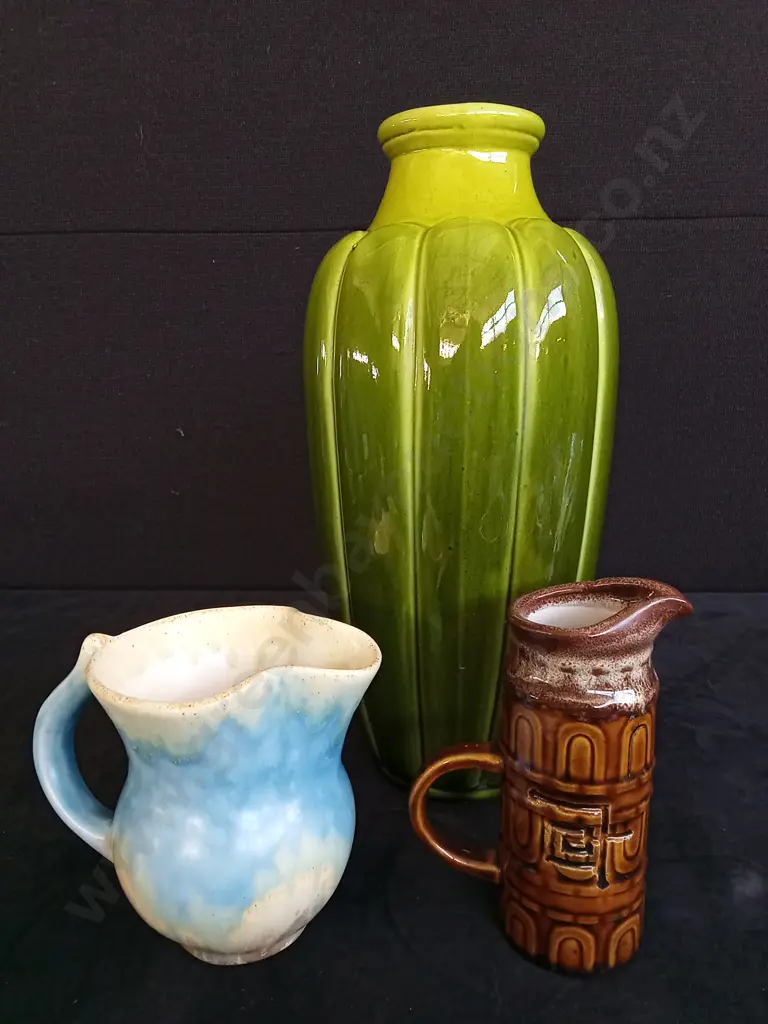 GREEN VASE WITH A LUSTRE GLAZE H31CM , BESWICK ART DECO JUG H10CM AND A CRAFT POTTERIES ADELAAR MILK JUG H13CM Image 1++