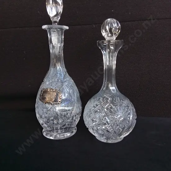 PAIR OF CUT GLASS DECANTERS, TALLEST H 37 CM