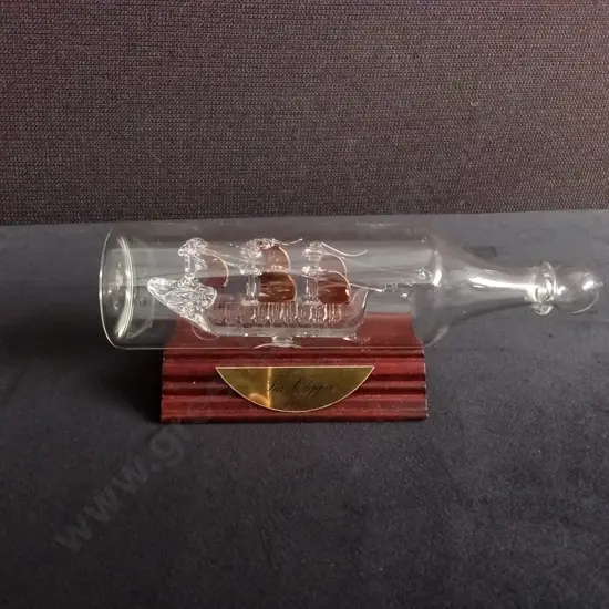 HAND BLOWN SPUN GLASS SHIP IN A BOTTLE, W 17 CM