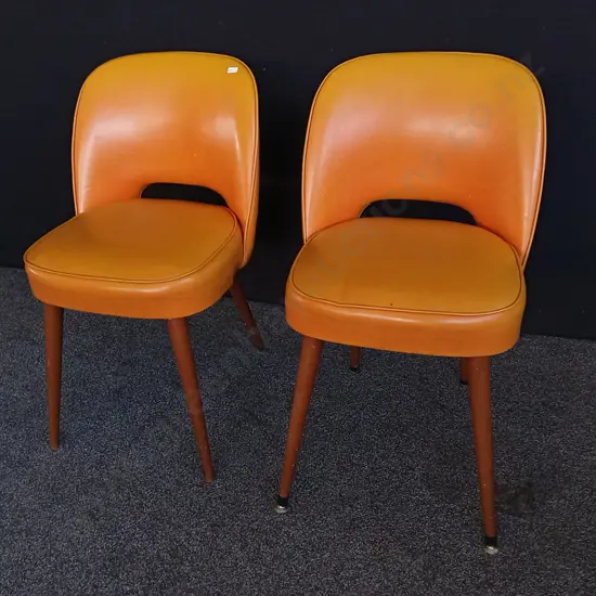 PAIR OF MID CENTURY VIBRANT ORANGE VINYL CHAIRS, H 80 CM