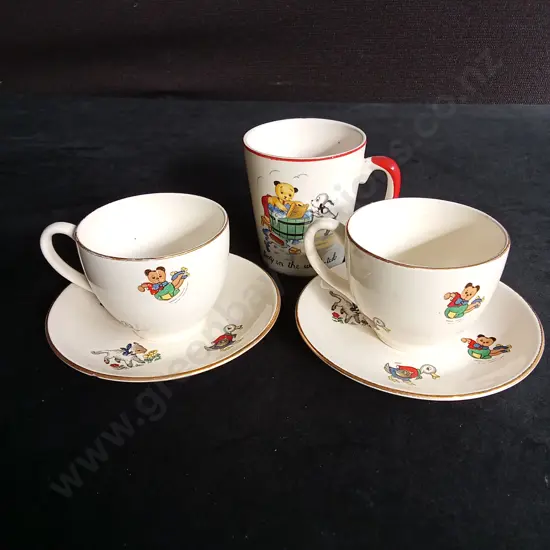 2 VINTAGE CROWN LYNN "WEE PETS" TEACUP AND SAUCERS AND A VINTAGE KEELE ST. POTTERY CHILDRENS MUG