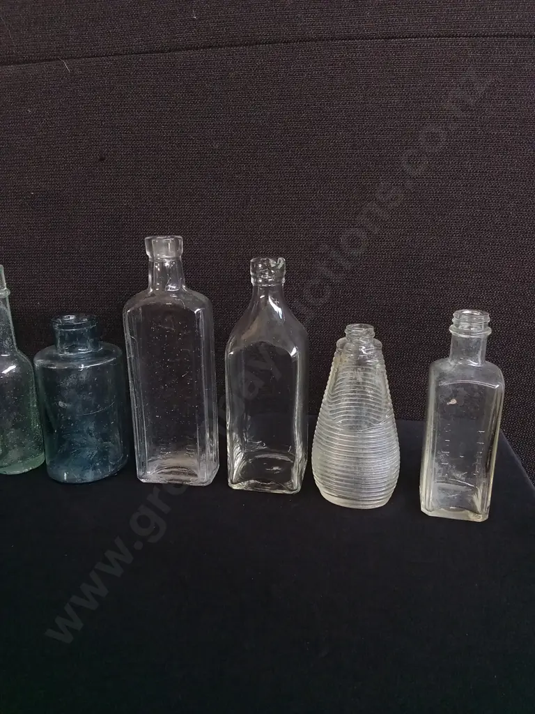 COLLECTION OF 10 VINTAGE AND ANTIQUE GLASS BOTTLES, INCLUDING MEDICINE, SODA, AND APOTHECARY BOTTLES Image 1++